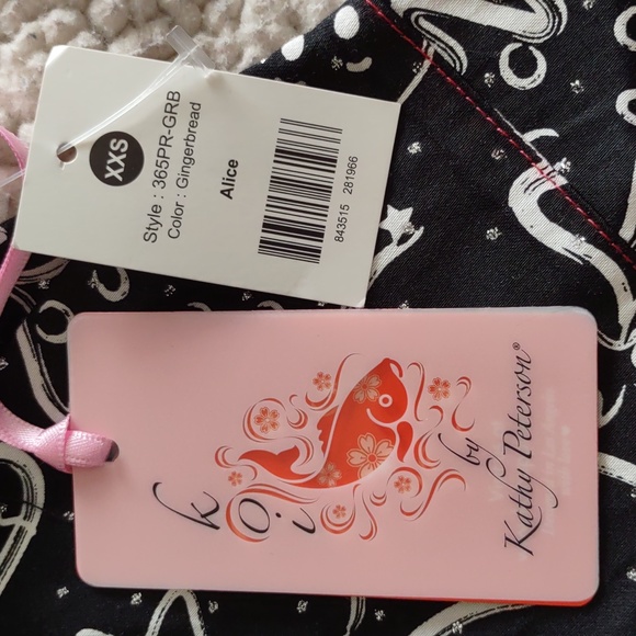 NWT Koi By Kathy Peterson Size XXS Black Metallic Gingerbread Alice Scrub Top - Picture 4 of 16